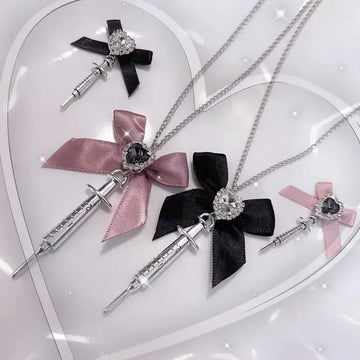 2024 New Love Heart Bowknot Metal Syringe Pendant Necklace for Women Dark Lolita Cool Trend Jewelry Gothic Fashion Accessories